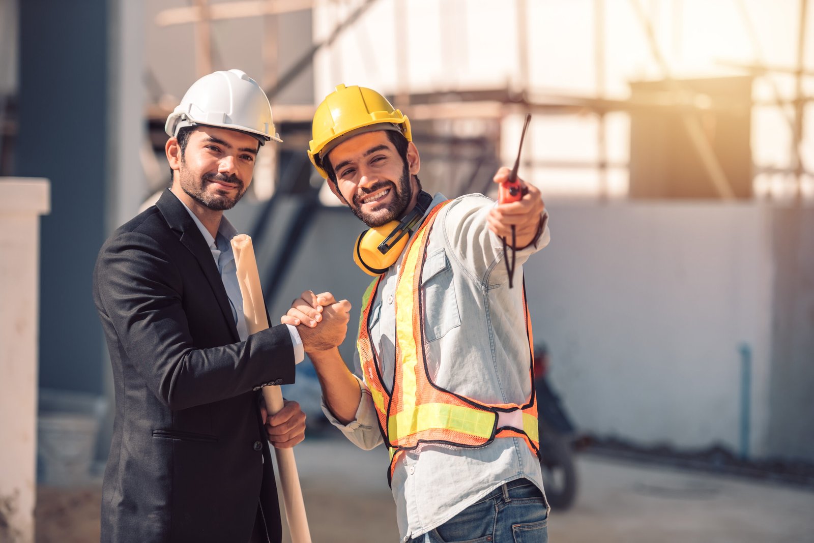happy-workers-construction-site-young-civil-engineer-manager-architects-handshaking-construction-site-looking-construction-phase-cooperation-teamwork-concept Happy workers at construction site, young civil engineer manager and architects handshaking at construction site and looking to next construction phase  , cooperation teamwork concept.